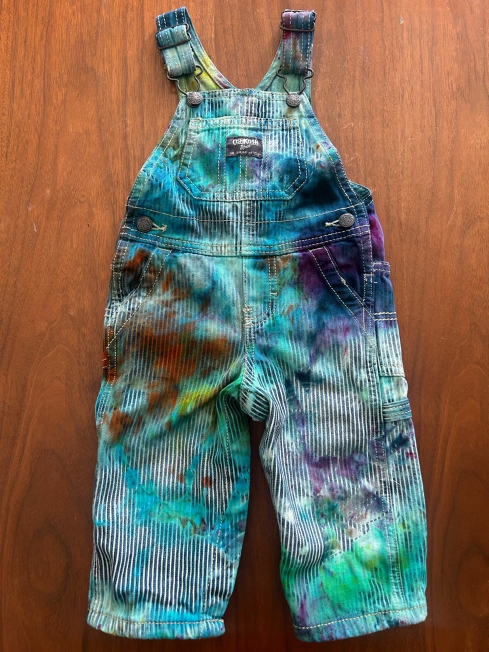 Oshkosh B’gosh tie dye railroad overalls Size 12 months